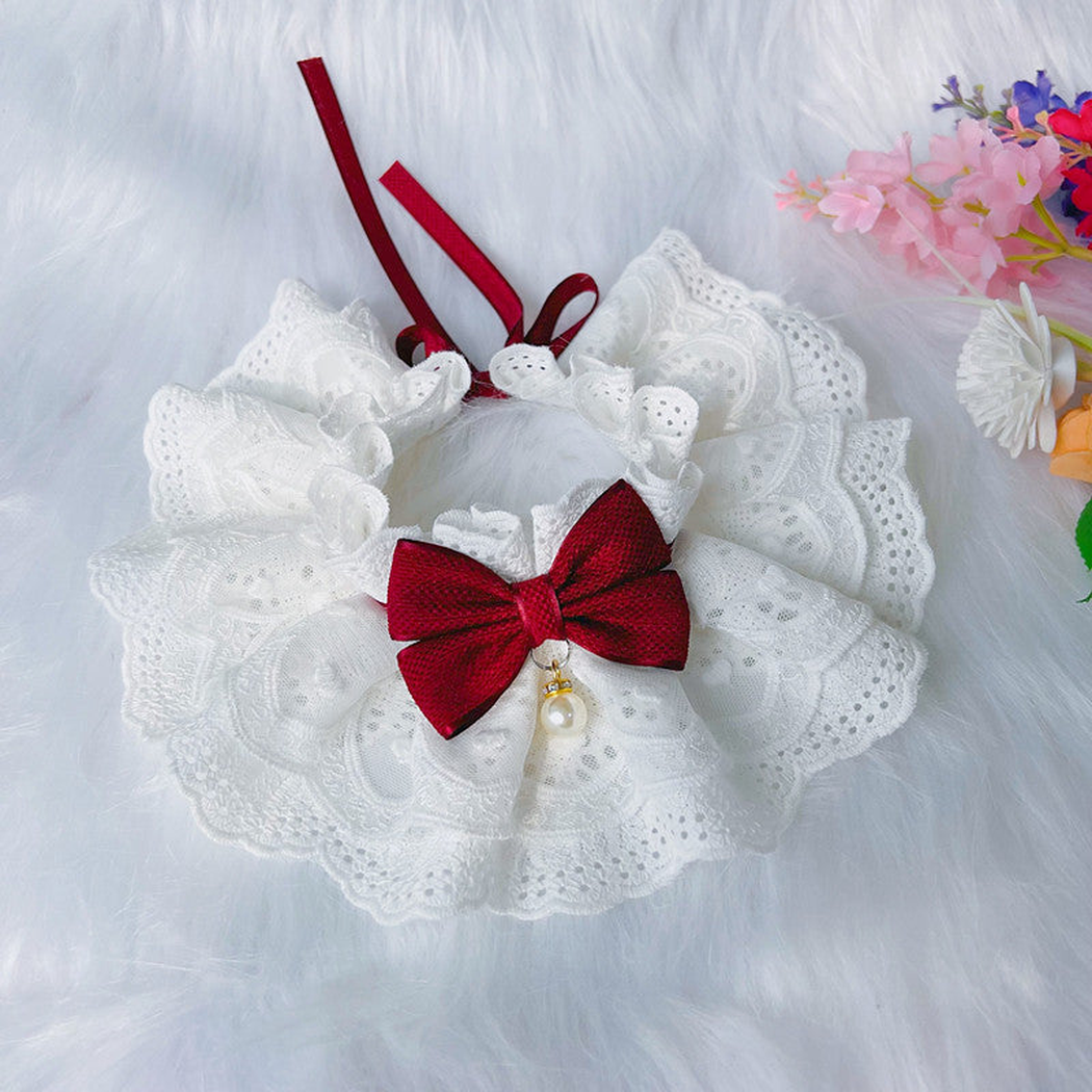 Burgundy bow pet neckwear with white layered ruffles and pearl-look detail