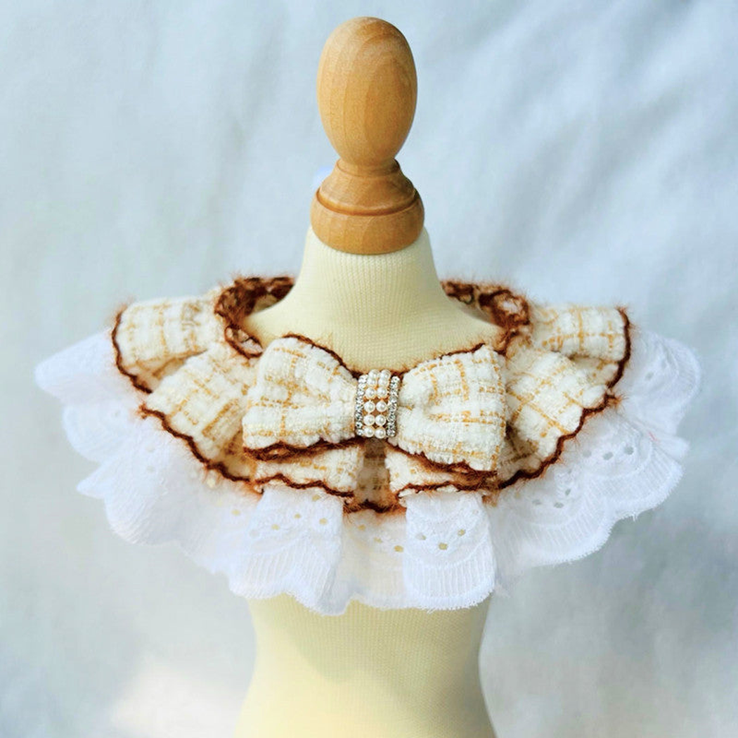 Beige plaid bow pet neckwear with pearl-look center band and white ruffle