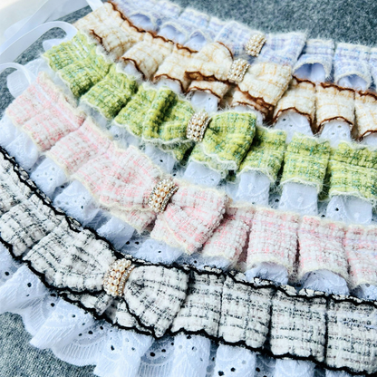 Multiple Styles of plaid bow pet neckwear displayed together