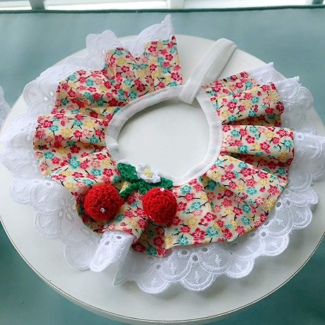 Floral ruffled pet neckwear with red fruit ornaments and white lace-look edging