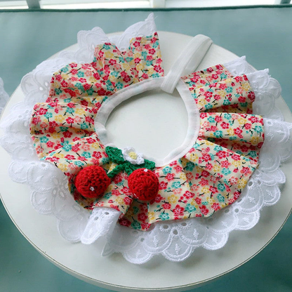 Floral ruffled pet neckwear with red fruit ornaments and white lace-look edging