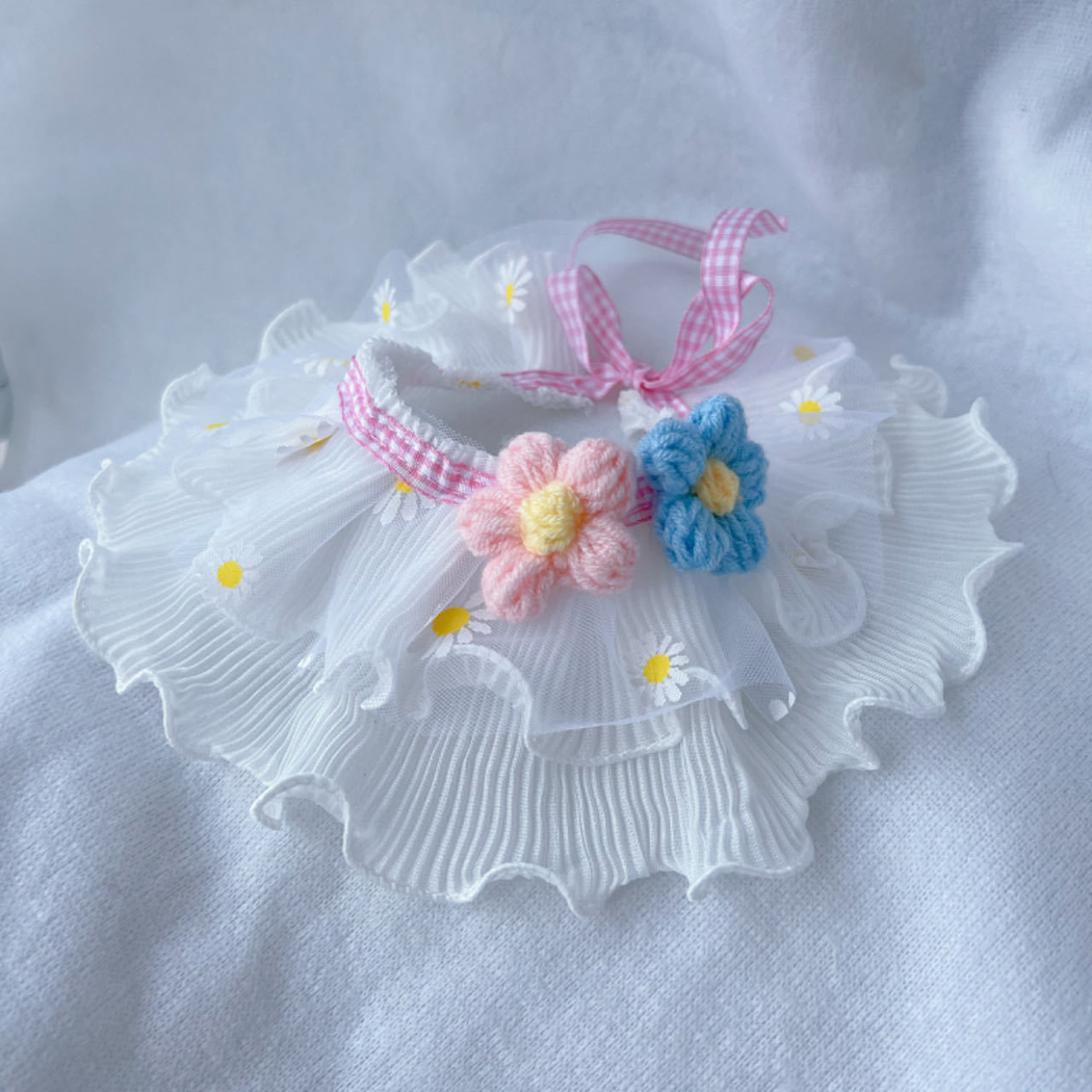 Pink daisy-print ruffled pet neckwear with pink and blue flower appliqués