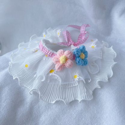 Pink daisy-print ruffled pet neckwear with pink and blue flower appliqués