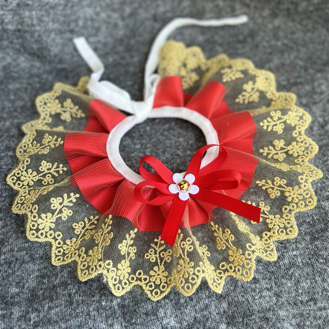 Red ruffled pet neckwear with a floral lace-look edge and bow