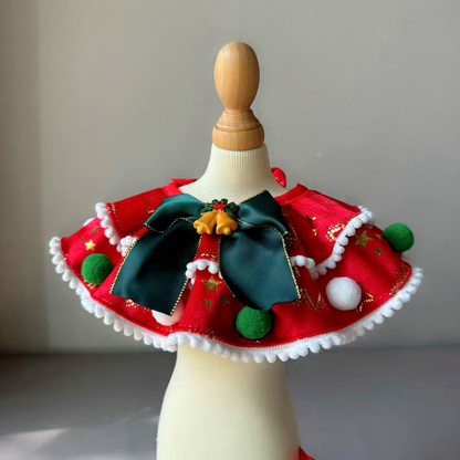 Stars pet neckwear in red with a dark green bow and pom-pom trim