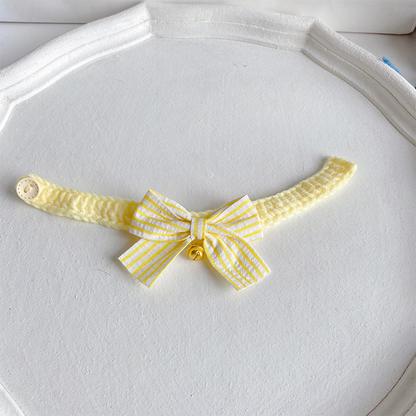 Yellow cat collar with striped bow and gold-tone bell