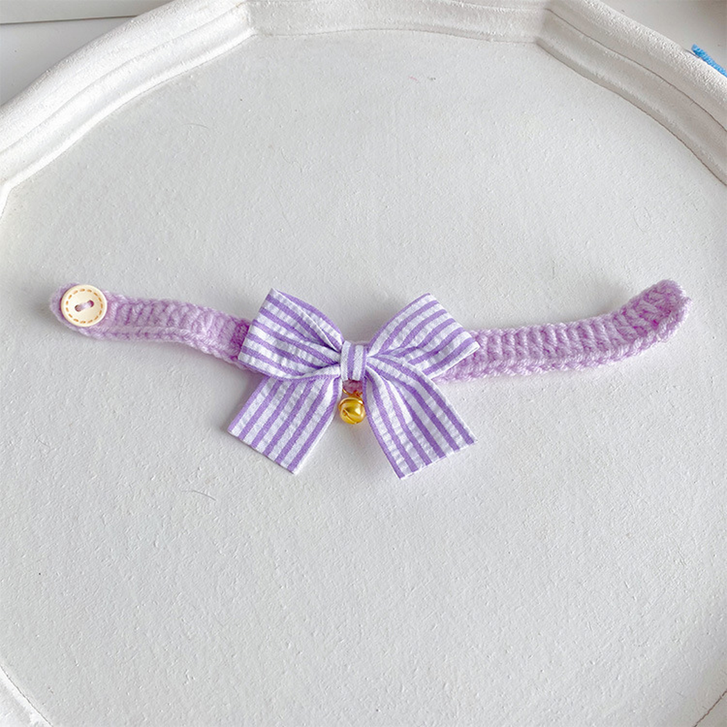 Light purple cat collar with striped bow and gold-tone bell