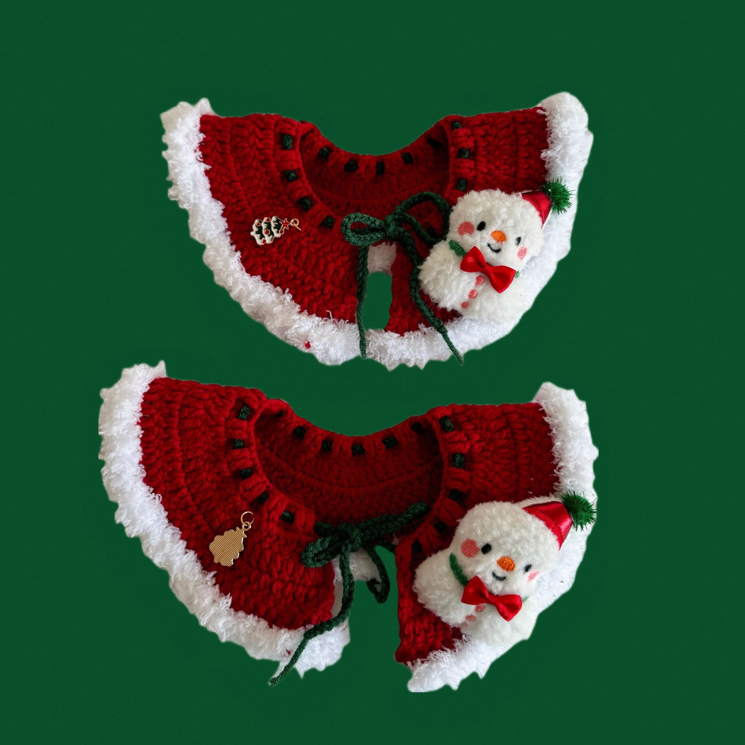 Two red pet neckwear examples with snowman appliqués and white trim