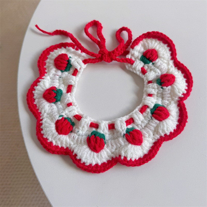 Red bib-style pet neckwear with raised flower buds and scalloped edging