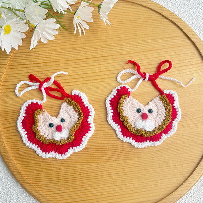 Two red Santa-face bib-style pet neckwear pieces with gold-tone trim