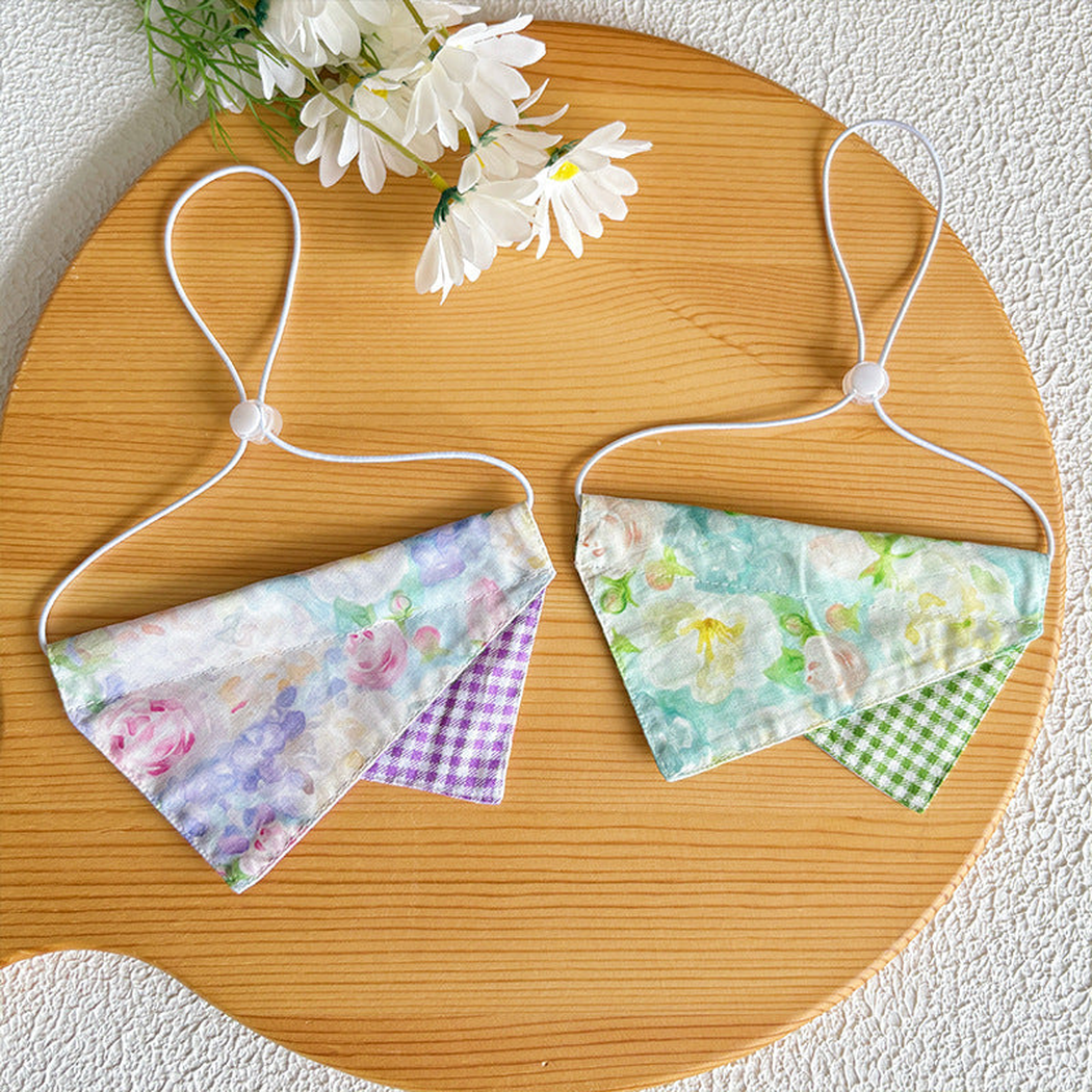 Purple and Green floral pet neckwear displayed together