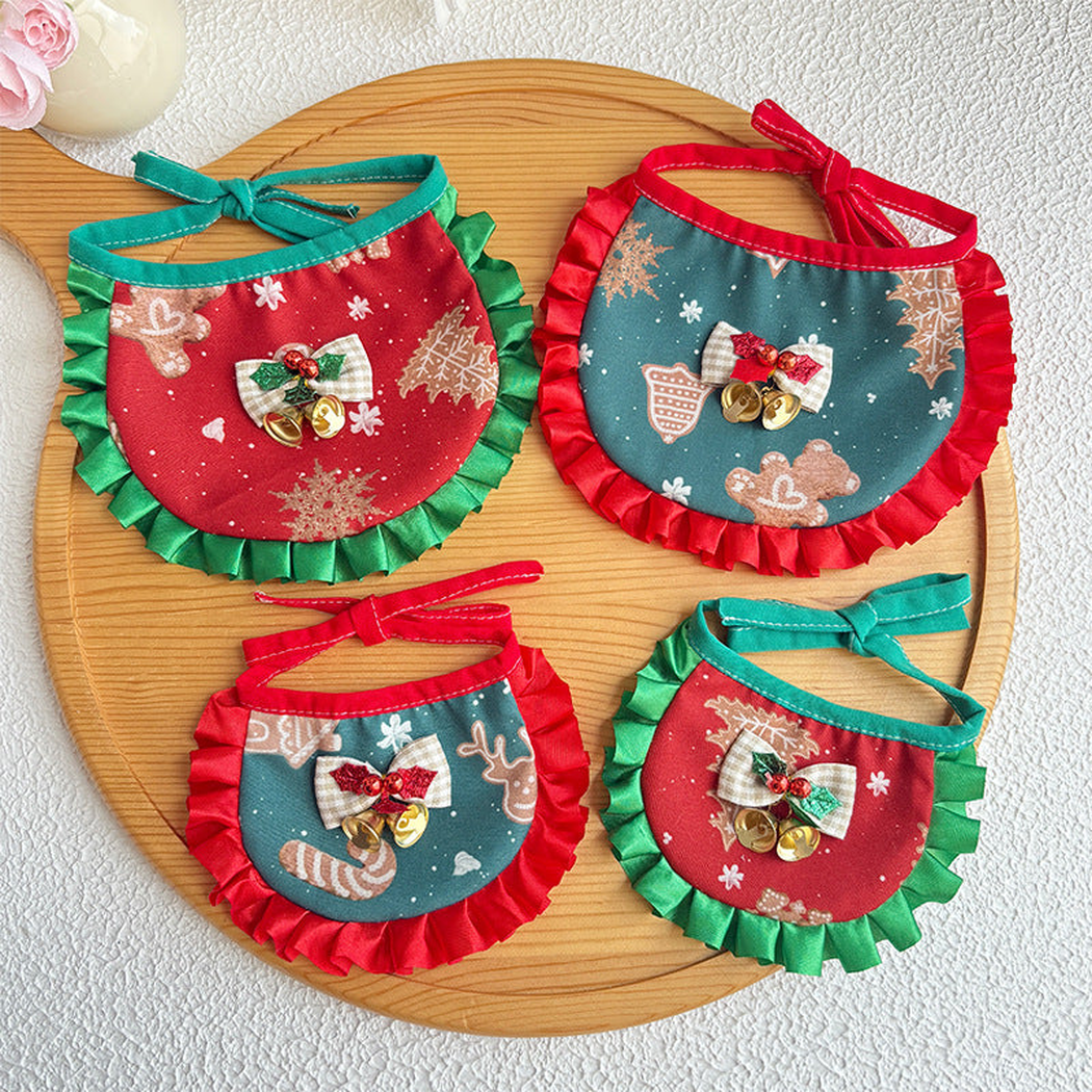 Four red and teal decorative pet neckwear bibs with ruffled trim and bell bows