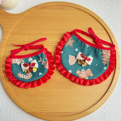Two sizes of Reindeer pet neckwear with teal printed bibs and red ruffled trim