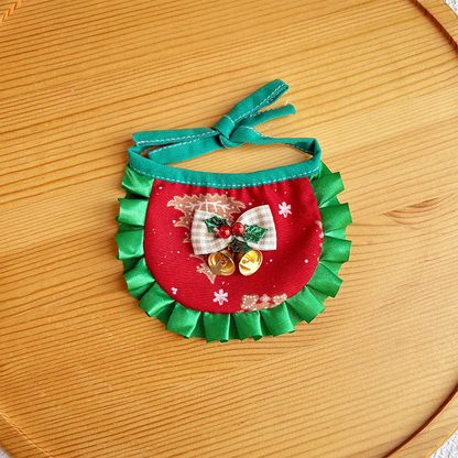 Gingerbread pet neckwear with red printed bib, green ruffled trim and bell bow