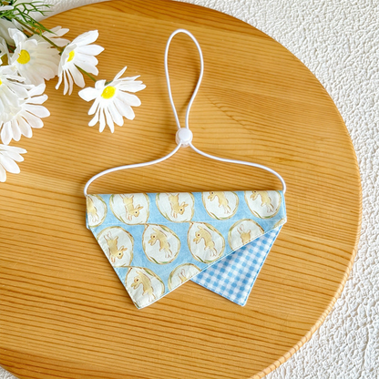 Light blue rabbit-pattern pet neckwear with gingham accent and white cord loop