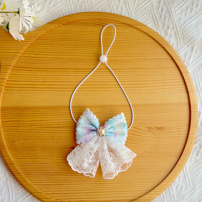 Light blue bow pet neckwear with white lace-look tails and adjustable loop