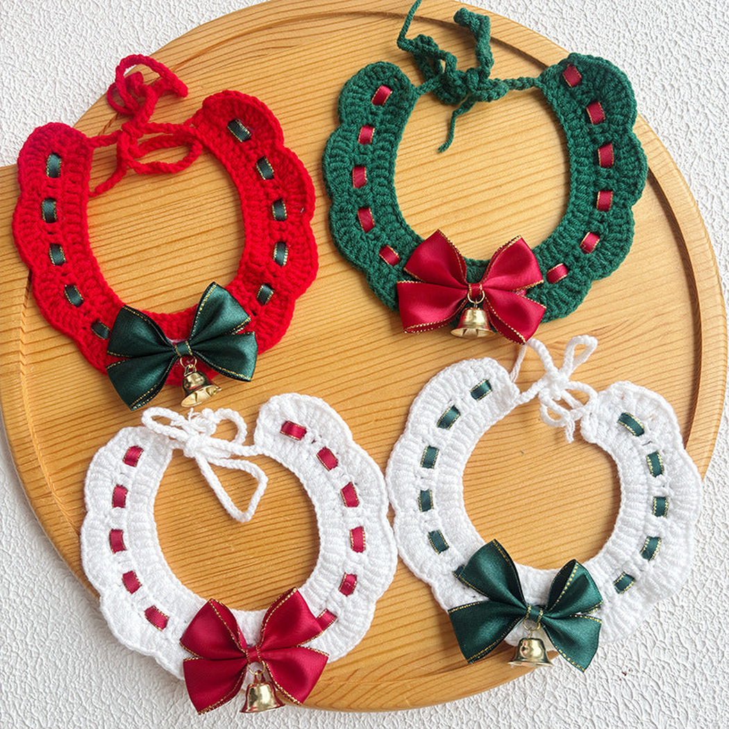 Four bow and bell pet neckwear styles displayed together