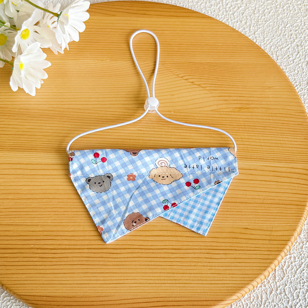 Light Blue check pet neckwear with overlapping pointed panels and adjustable cord