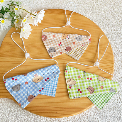 Light blue, green and khaki check pet neckwear displayed together