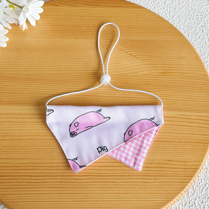 Pig style pet neckwear with pink gingham accent and adjustable white cord loop