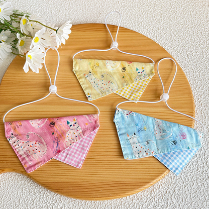 Pink, light blue and yellow doodle cat pet neckwear displayed together
