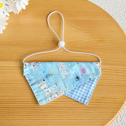Light blue doodle cat pet neckwear with gingham accent and white neck loop