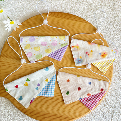Four patterned pet neckwear styles displayed together