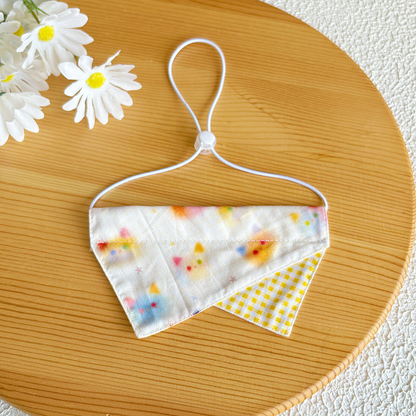 Cat pet neckwear with a colorful cat-face print and yellow gingham accent
