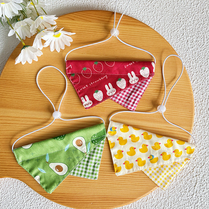 Strawberry, Avocado and Duck pet neckwear displayed together