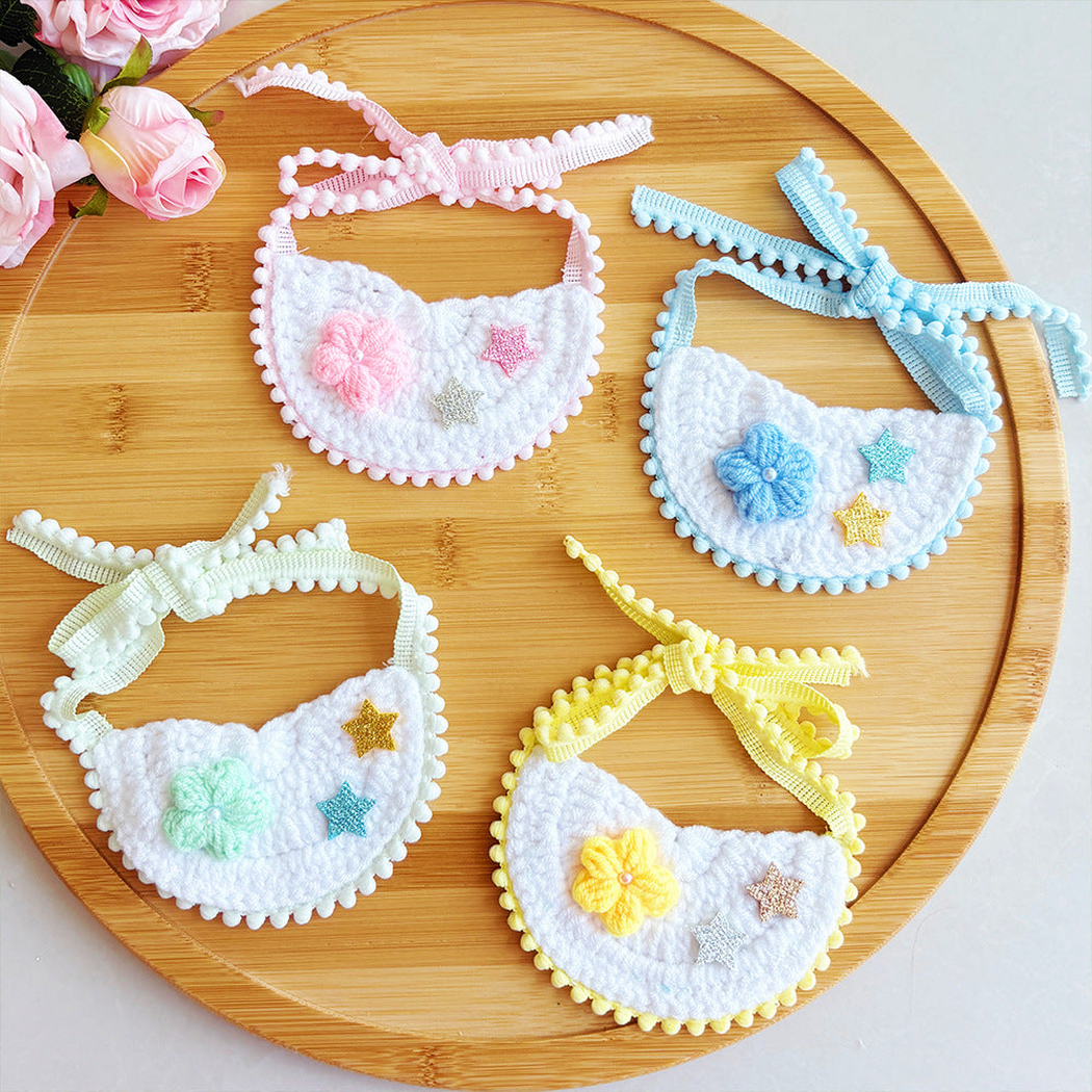 Pink, light blue, mint, and yellow pet neckwear displayed together