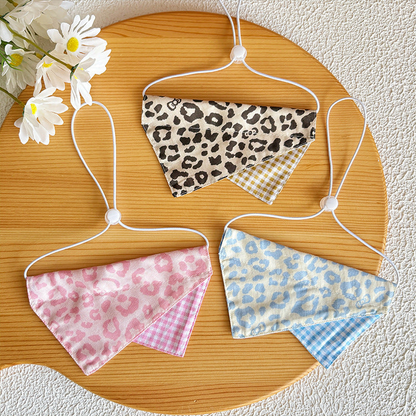 Pink, Light Blue, and Beige leopard-print pet neckwear displayed together