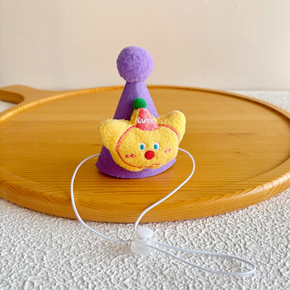 Purple Hat with yellow character-face decoration, top pom-pom and tie cord