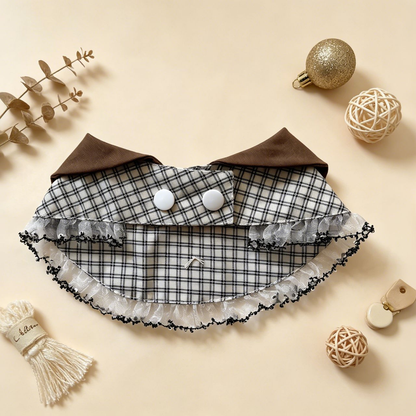 Back view of Brown plaid cat neckwear showing the snap fastening