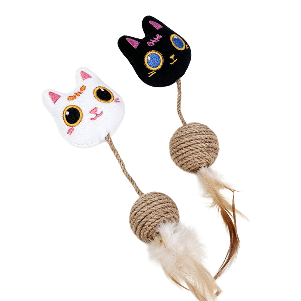 Black and white cat-head toys with rope-wrapped balls and feather tails