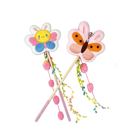 Flower and butterfly cat teaser wands with trailing pom-poms and colorful ribbons