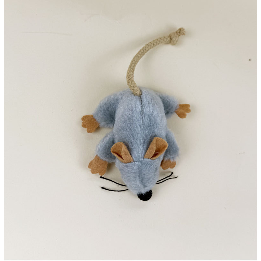 Gray mouse-shaped cat toy with tan ears and paws and a centered rope tail, top view