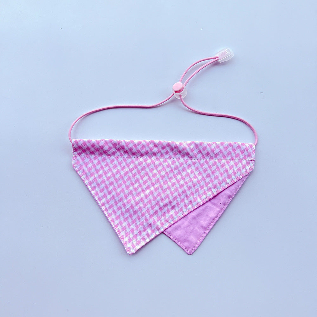 Pink gingham Pet Neckwear with overlapping triangular panels and a pink cord loop.