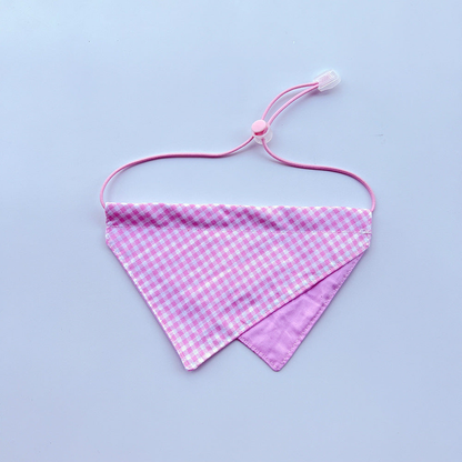 Pink gingham Pet Neckwear with overlapping triangular panels and a pink cord loop.