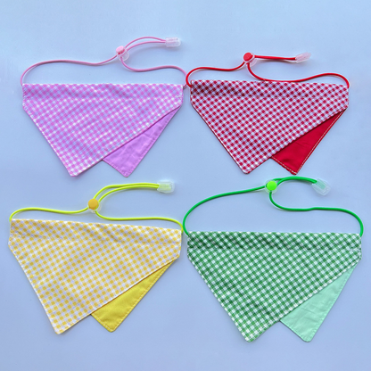 Pink, Red, Yellow and Green gingham Pet Neckwear arranged together with cord loops visible.