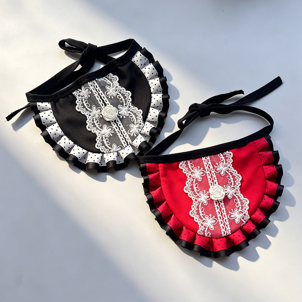 Black and red bib-style pet neckwear with floral lace-look panels and ruffled borders
