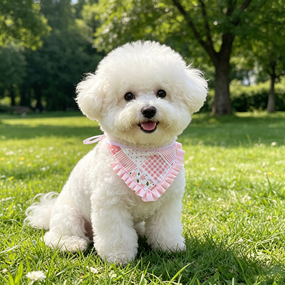 White dog wearing pink tie bandana pet neckwear outdoors