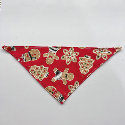 Red Bandana pet neckwear laid flat, with gingerbread figures, snowmen, trees, and red corner snaps.