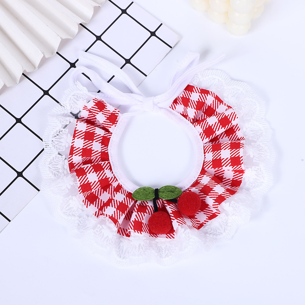 Red gingham Pet Neckwear spread into a rounded ruffle, with bow ties, cherry accents and white lace-look trim.