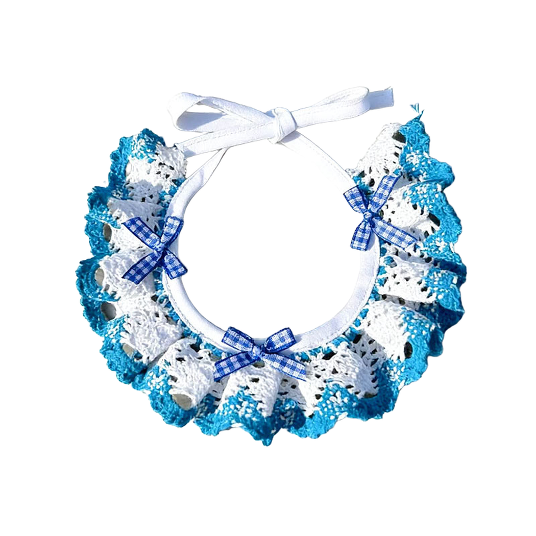 Turquoise and white ruffled pet neckwear with blue gingham bows and white ties, displayed on white.