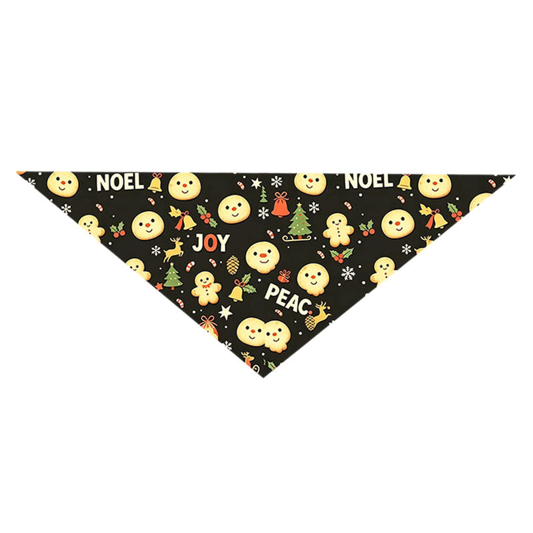 Gingerbread pet neckwear with a black triangular shape and cookie motifs, laid flat.
