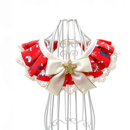 Red pleated pet neckwear with lace-look edging, an ivory bow and a gold-tone star accent on a white display stand.