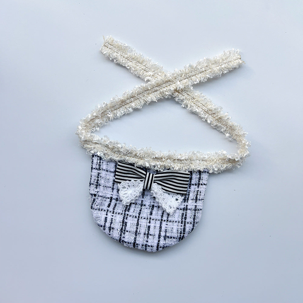 White Lace Pet Neckwear with a black-and-white checked bib, striped bow, and lace-look bow tails.