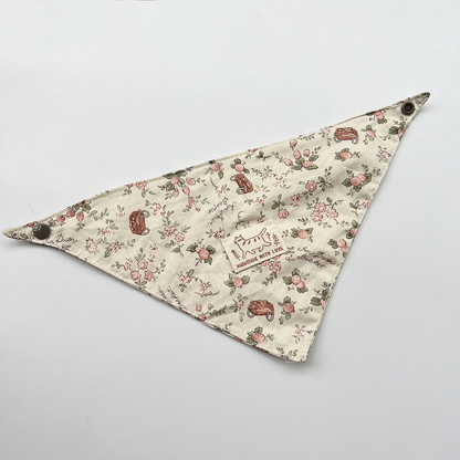 Brown Bandana Pet Neckwear with floral and basket motifs, a cat illustration patch and dark corner snaps.