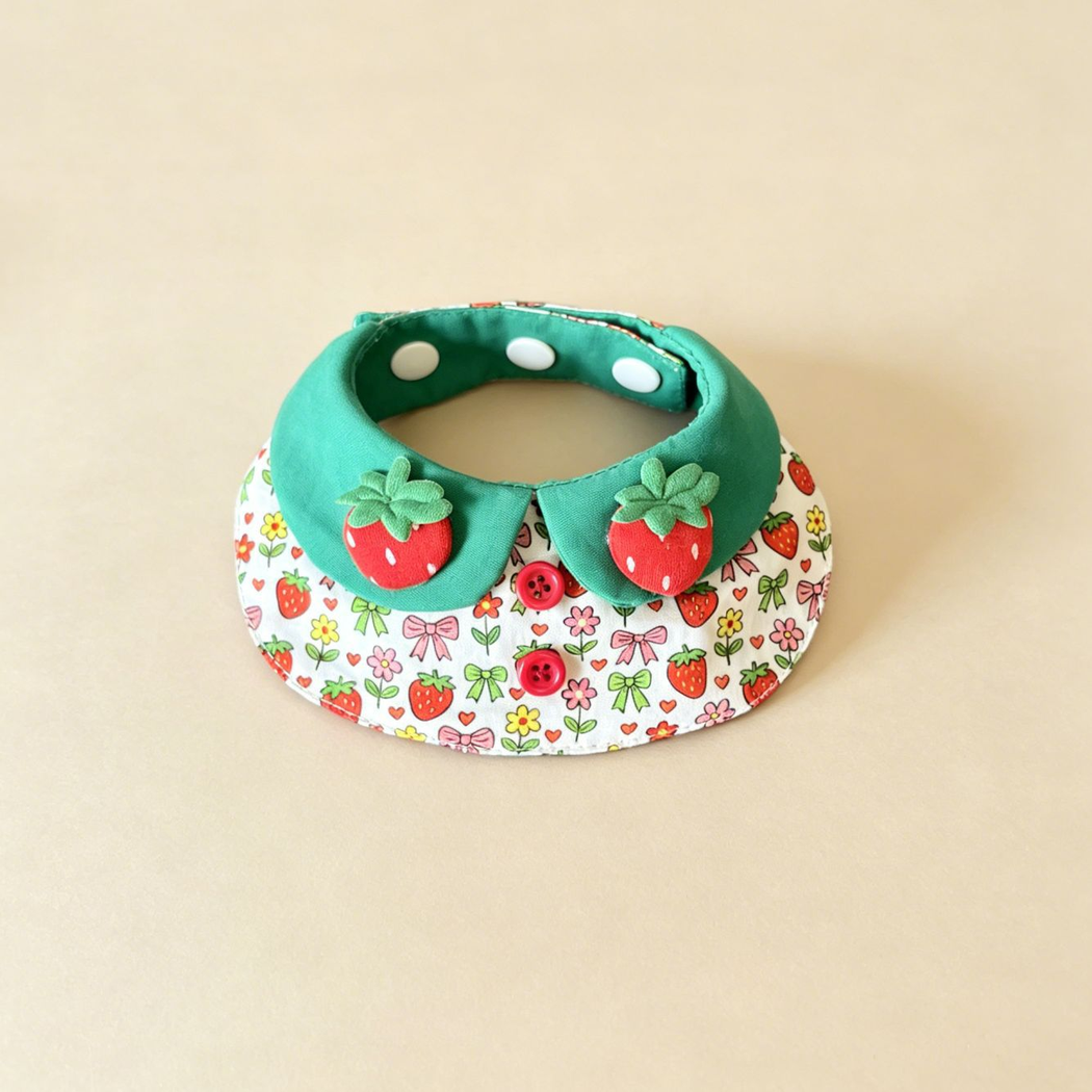 Hearts pet neckwear with green neck panels, strawberry decorations, and a colorful heart, flower and bow print.