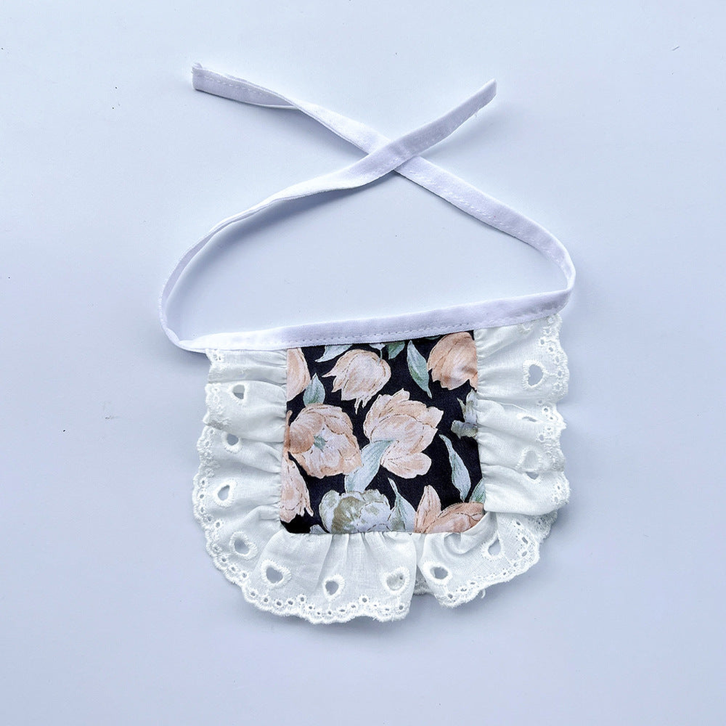 Upright floral Pet Neckwear with white ties and white ruffles featuring heart-shaped eyelets.